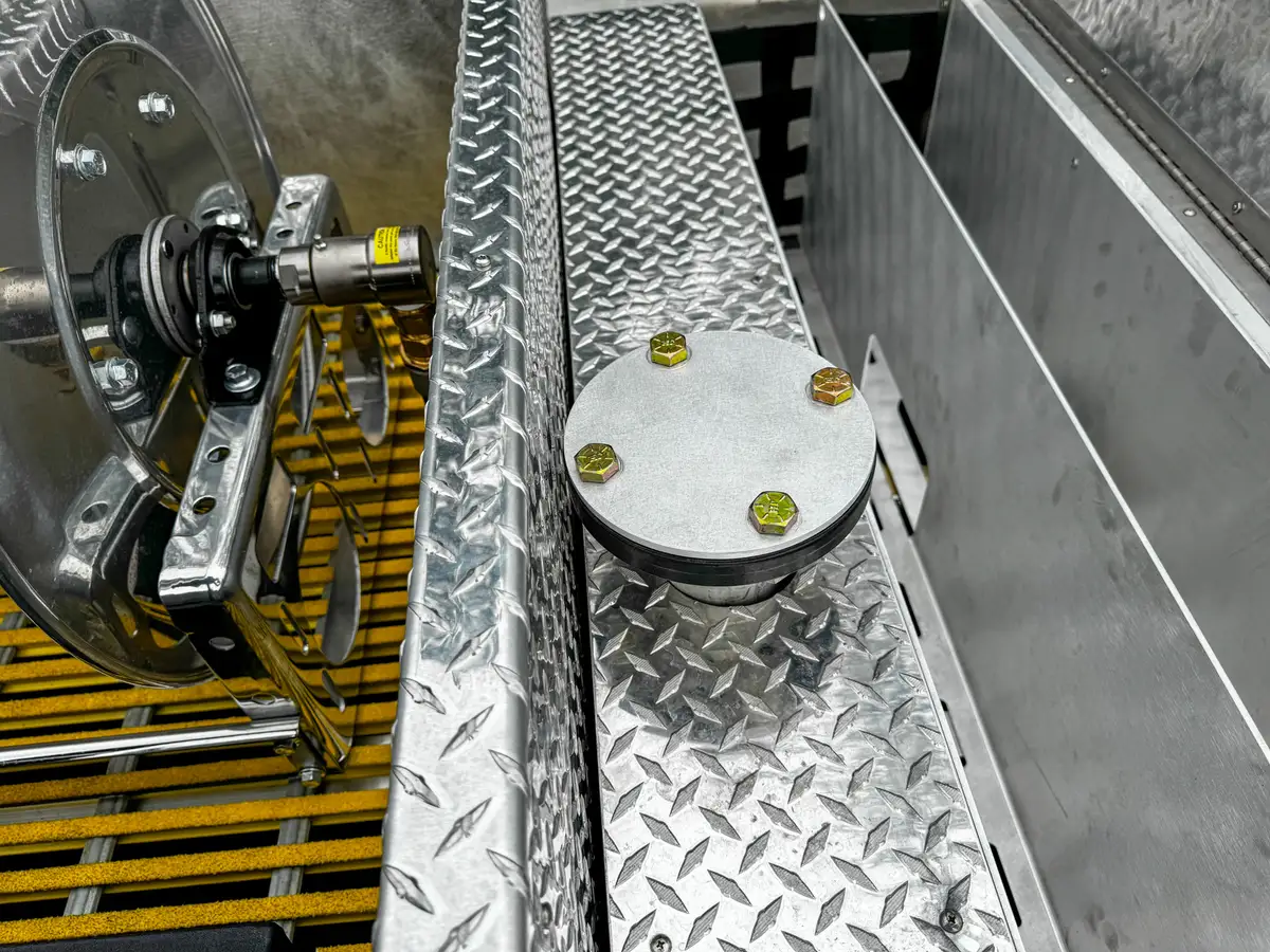 Cab roof rear close-up showing lightbar and antenna mount points.